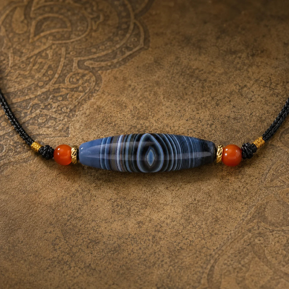 Kailora Tibetan Blue Eye Agate Dzi-Inspired Leather Cord Necklace detail view 2 | Kailora