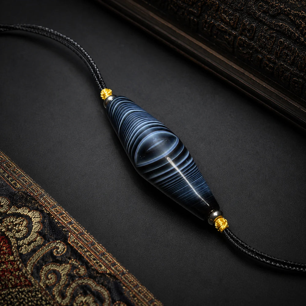 Kailora Tibetan Eye Agate Dzi-Inspired Leather Cord Necklace detail view 3 | Kailora