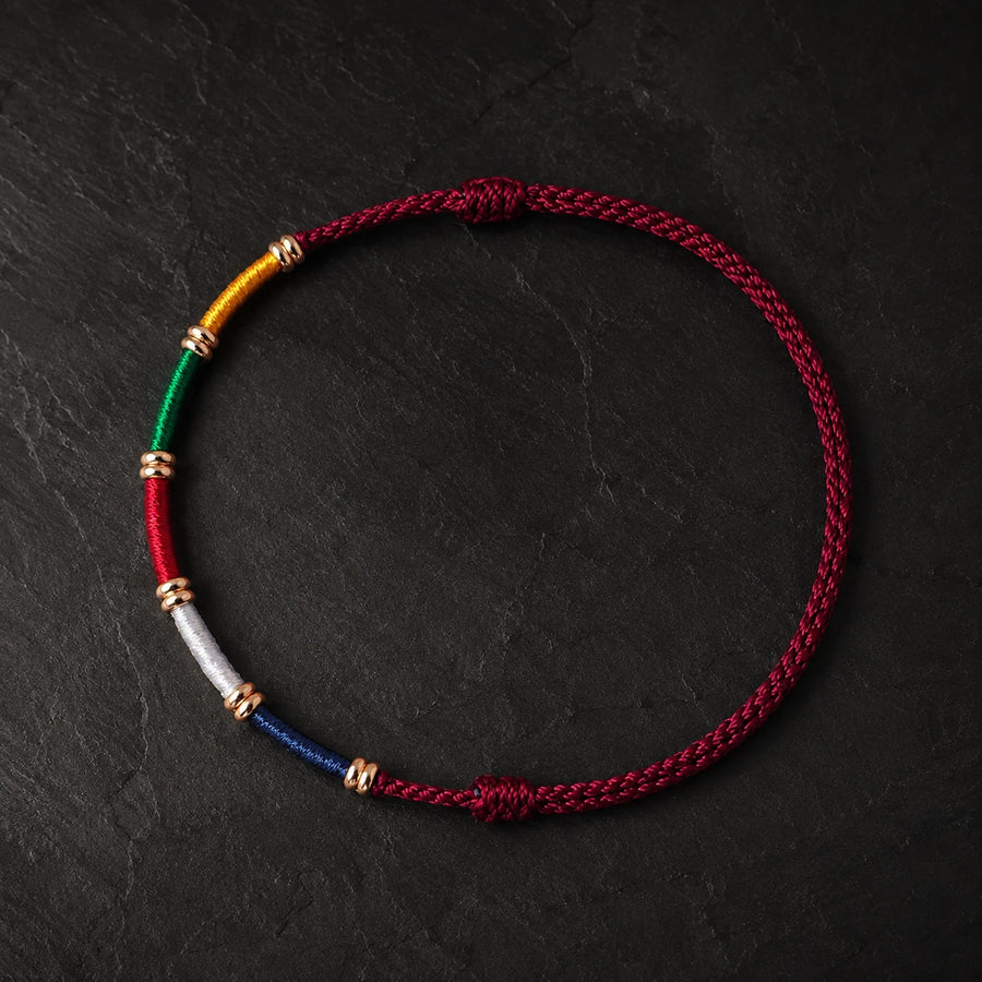 Tibetan five-color prayer flag cord bracelet in burgundy by Kailora detail view 2 | Kailora