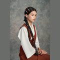 Tibetan handmade red and turquoise hair clips styled with long braids thumbnail 9 | Kailora