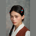 Tibetan handmade turquoise blossom hair clips portrait styling thumbnail 10 | Kailora