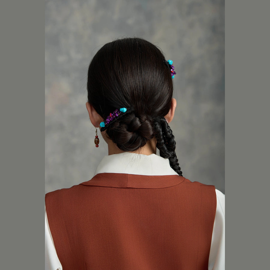 Tibetan handmade purple crystal and turquoise hair clip styled around a low bun detail view 12 | Kailora