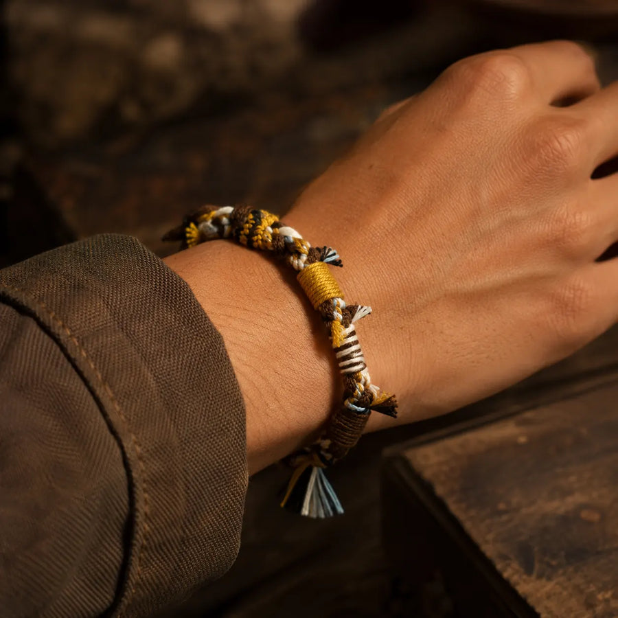 Earth Gold Tibetan hemp handwoven bracelet worn on the wrist detail view 6 | Kailora