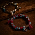 Three Nomad Thread Tibetan hemp bracelets in a warm artisan setting thumbnail 10 | Kailora