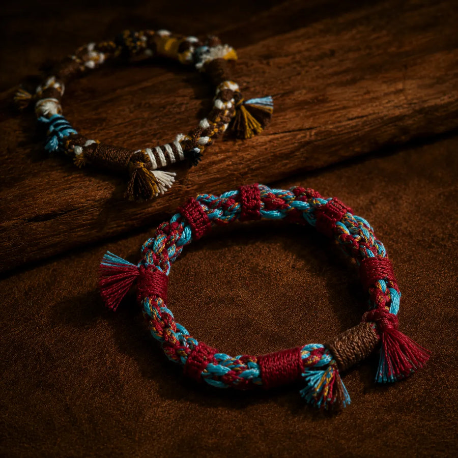 Three Nomad Thread Tibetan hemp bracelets in a warm artisan setting detail view 10 | Kailora