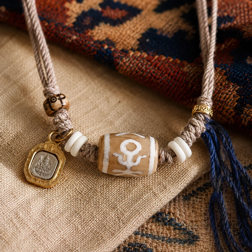 Kailora Tibetan Noble Dzi Agate Cord Necklace with Zaki Lhamo Prosperity Charm detail view 7 | Kailora