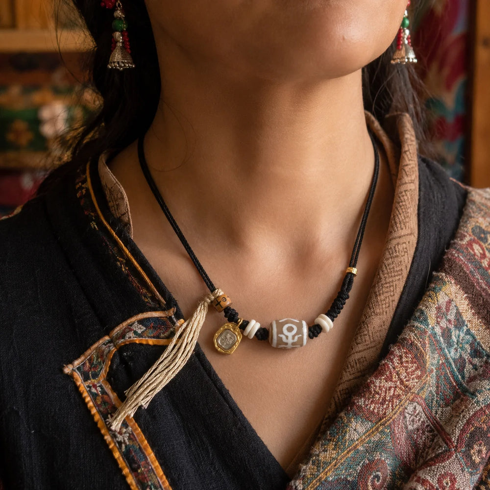 Kailora Tibetan Noble Dzi Agate Cord Necklace with Zaki Lhamo Prosperity Charm detail view 4 | Kailora