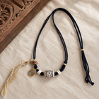 Kailora Tibetan Noble Dzi Agate Cord Necklace with Zaki Lhamo Prosperity Charm thumbnail 1 | Kailora