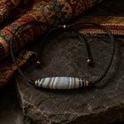 Kailora Tibetan Sky Eye Banded Agate Dzi-Inspired Leather Cord Necklace thumbnail 2 | Kailora