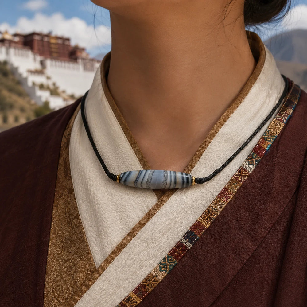Kailora Tibetan Sky Eye Banded Agate Dzi-Inspired Leather Cord Necklace detail view 6 | Kailora