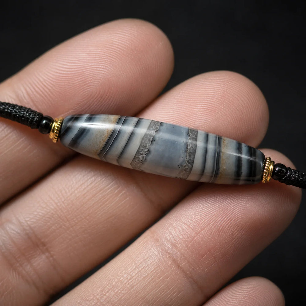 Kailora Tibetan Sky Eye Banded Agate Dzi-Inspired Leather Cord Necklace detail view 7 | Kailora