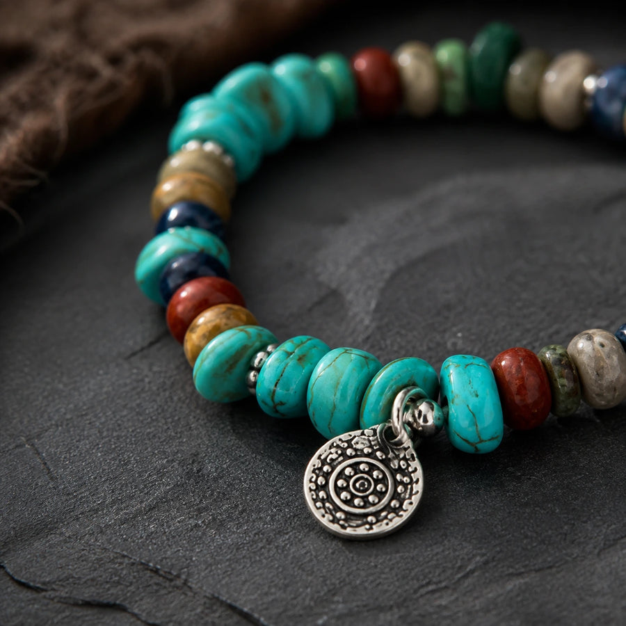 Close-up of turquoise bracelet charm with mixed stone beads and silver-toned details detail view 2 | Kailora