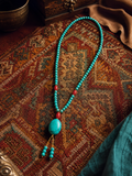 Cotton cord and natural turquoise bead details on Kailora 108 mala necklace thumbnail 4 | Kailora