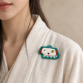 Model wearing Xu Dog Chinese Zodiac hand-embroidered cotton-linen brooch handcrafted in Tibet thumbnail 32 | Kailora