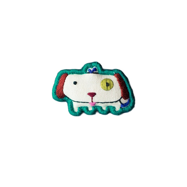 Xu Dog Chinese Zodiac hand-embroidered cotton-linen brooch handcrafted in Tibet detail view 12 | Kailora