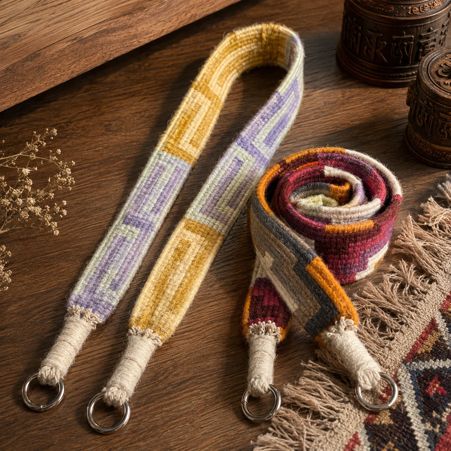 Two handwoven yak wool camera and phone strap colorways in a Tibetan-inspired still life detail view 7 | Kailora