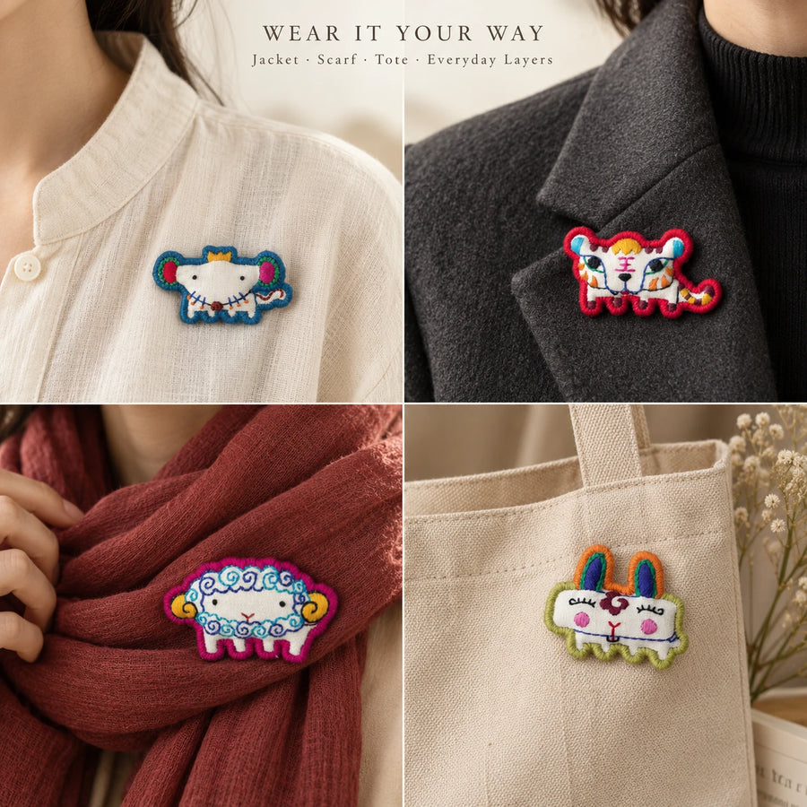Kailora Chinese Zodiac brooches styled on clothing, scarf and tote bag detail view 20 | Kailora