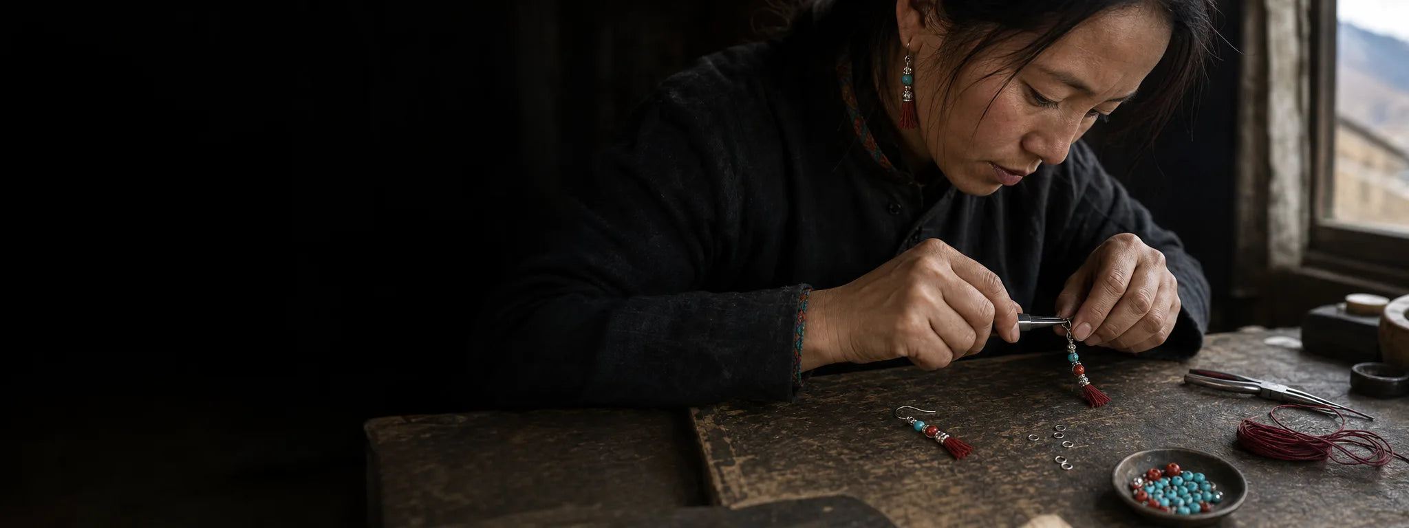 Tibetan-inspired artisan scene assembling turquoise and tassel earrings